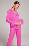 woman wearing Darcie hot pink pyjamas with hands in front of stomach