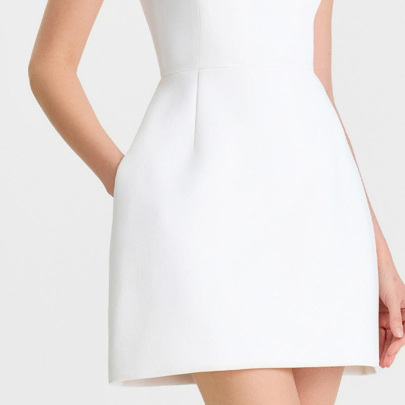 White dress with a plain background